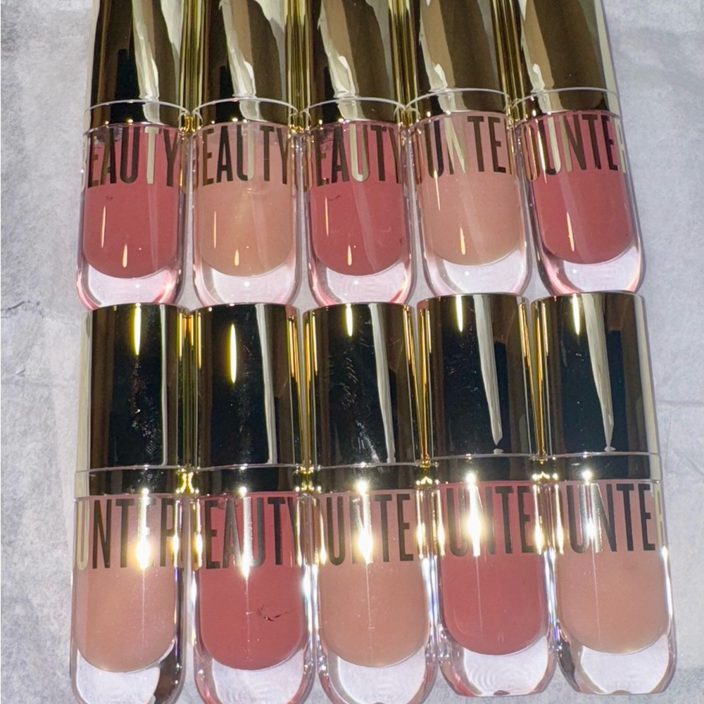 Beautycounter Pink and daisy shimmer Lipgloss Collection